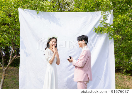 Korean Asian couple self small wedding concept in spring_propose 91676087