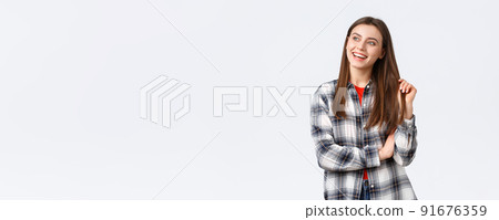 Lifestyle, different emotions, leisure activities concept. Dreamy and delighted, happy smiling woman, female student in checked casual shirt looking upper left corner with pleased expression Lifestyle, different emotions, leisure activities concept. Dreamy and delighted, happy smiling woman, female student in checked casual shirt looking upper left corner with pleased expression 91676359