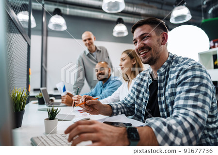 Young business team working on a project in office. 91677736