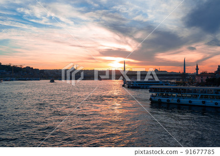 Boats in sea and scenic sunset in Istanbul 91677785