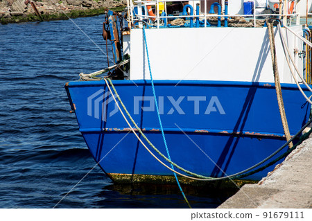 Stern of Blue Painted Fishing Boat at a Harbour Location Stern of Blue Painted Fishing Boat at a Harbour Location 91679111