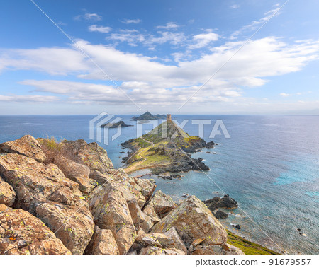 Popular tourist destination Torra di a Parata with Genoese Tower and Archipelago of Sanguinaires Popular tourist destination Torra di a Parata with Genoese Tower and Archipelago of Sanguinaires 91679557