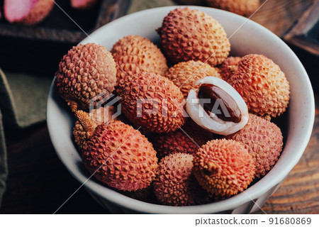 Delicious Lychee Fruits in Bowl 91680869