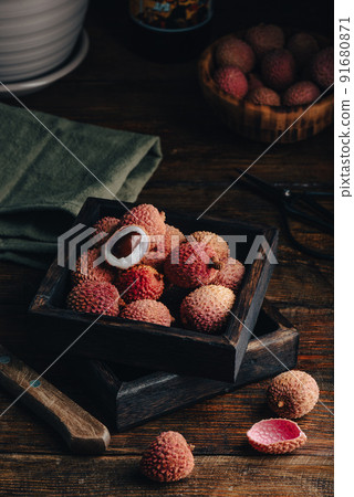 Litchis in Wooden Container 91680871