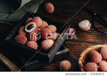Fresh Fruits of Lychee in Wooden Box 91680872