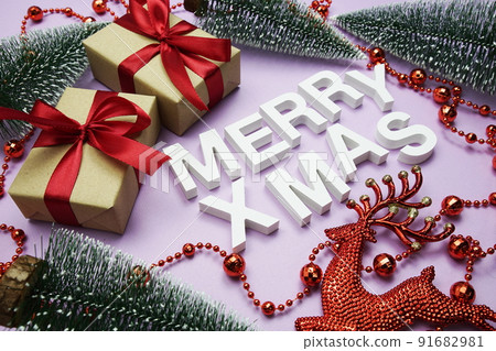 Merry XMAS alphabet letters with Christmas decorate on purple background Merry XMAS alphabet letters with Christmas decorate on purple background 91682981