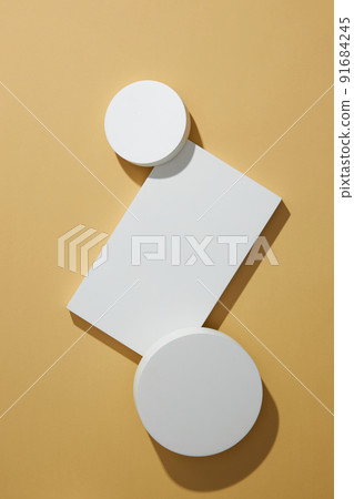Top view of circle , square white podium , in light brown background and blank space for advertising , abstract content Top view of circle , square white podium , in light brown background and blank space for advertising , abstract content 91684245