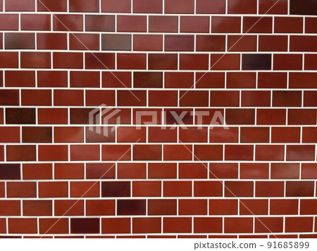 Red and brown brick wall background texture 91685899