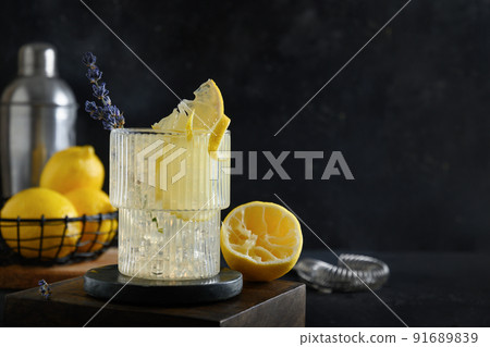 Summer lavender lemonade with lemon in glasses for party. 91689839