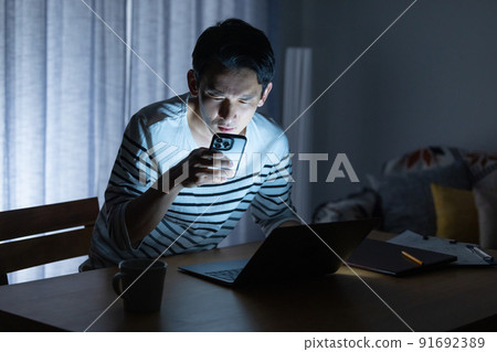 Image of being in trouble due to a power outage during telework 91692389