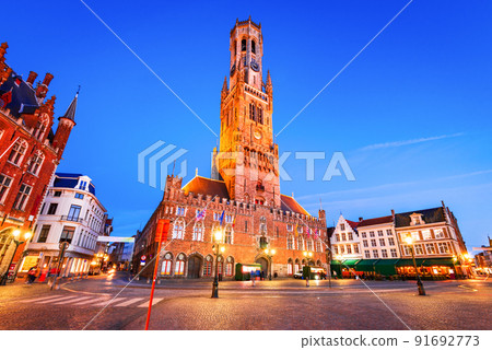 Bruges, Belgium. Blue hour in Grote Markt with Belfry, famous city of Flanders. Bruges, Belgium. Blue hour in Grote Markt with Belfry, famous city of Flanders. 91692773