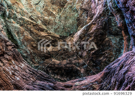 The Genoveva cave, a colorful rock formation as a result of erosion The Genoveva cave, a colorful rock formation as a result of erosion 91696329