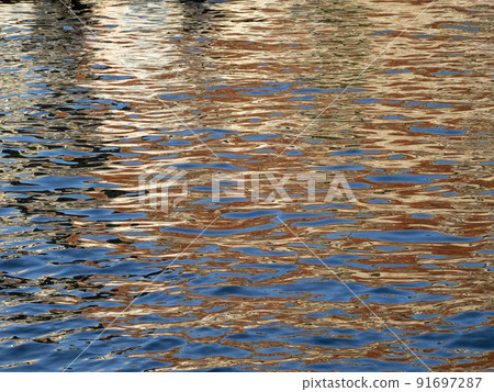 orange reflections on the sea like painting 91697287