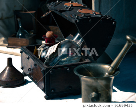 small trunk with bottles of oil or particular essences inside 91699435