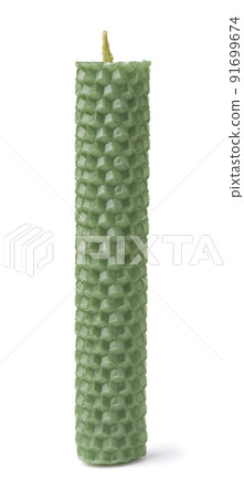 Front view of green beeswax honeycomb candle 91699674