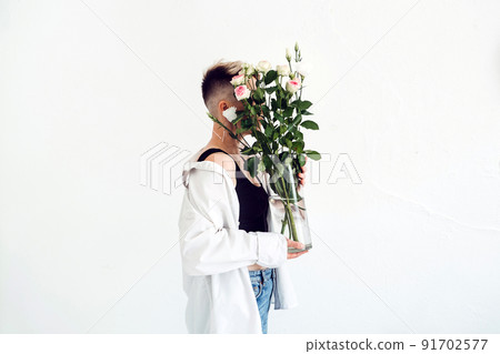 Happy woman florist with Wonderful Edible Wedding Bridal Flower Bouquets in studio Happy woman florist with Wonderful Edible Wedding Bridal Flower Bouquets in studio 91702577