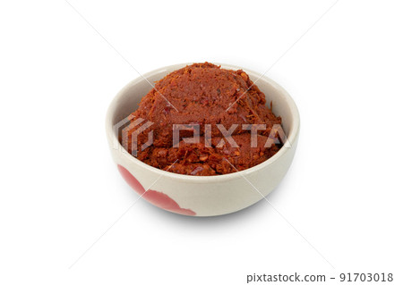 Thai red curry paste in a bowl isolated on white background with Clipping Path Thai red curry paste in a bowl isolated on white background with Clipping Path 91703018