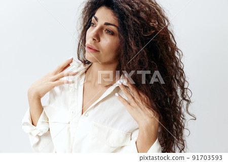FASHION OFFER. Headshot portrait Curly Pretty Pensive Latin Female Lady Zipping White Shirt Touching Collar copy space, free place Looking Aside Isolated At White Studio Background. Banner, Mockup FASHION OFFER. Headshot portrait Curly Pretty Pensive Latin Female Lady Zipping White Shirt Touching Collar copy space, free place Looking Aside Isolated At White Studio Background. Banner, Mockup 91703593