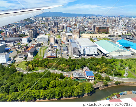 Fukuoka city seen from the cabin just before landing at Fukuoka Airport Fukuoka city seen from the cabin just before landing at Fukuoka Airport 91707883