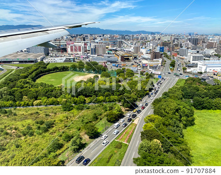 Fukuoka city seen from the cabin just before landing at Fukuoka Airport Fukuoka city seen from the cabin just before landing at Fukuoka Airport 91707884