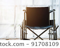 Close up view of empty wheelchair waiting for patient services with vintage filtered. 91708109