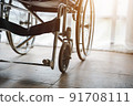 Close up view of empty wheelchair waiting for patient services with vintage filtered. 91708111