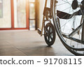 Close up view of empty wheelchair waiting for patient services with vintage filtered. 91708115