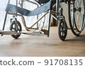 Close up view of empty wheelchair waiting for patient services with vintage filtered. 91708135