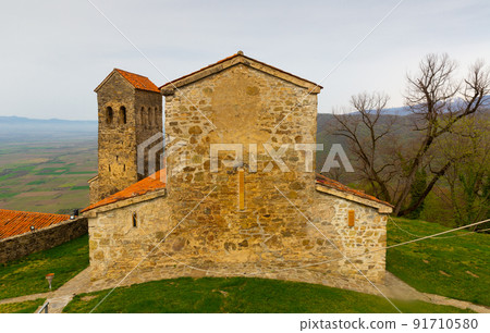 Spring landscape with ancient structures of Nekresi monastery Spring landscape with ancient structures of Nekresi monastery 91710580