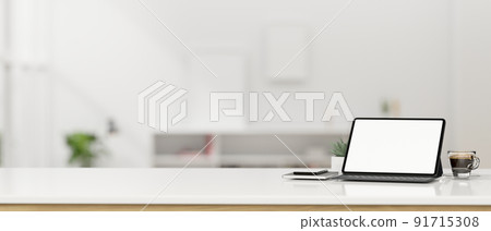 Tablet mockup with wireless keyboard and empty space on tabletop over blurred office in background 91715308