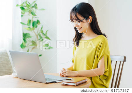 Woman doing telework at home 91717357