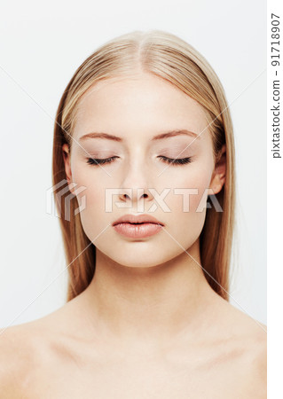 Beautifully beautiful. A beautiful young woman with her eyes closed isolated on white. Beautifully beautiful. A beautiful young woman with her eyes closed isolated on white. 91718907