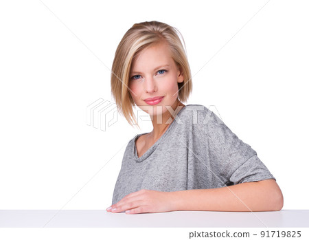 Natural charm. A studio portrait of a beautiful young woman, isolated on white. 91719825