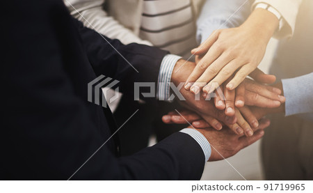 Where there is unity there is victory. Cropped shot of a group of businesspeople putting their hands together in unity. Where there is unity there is victory. Cropped shot of a group of businesspeople putting their hands together in unity. 91719965
