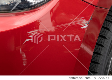 The front part of a damaged car 91720255