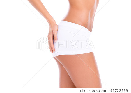 Nice fit. Cropped studio shot of a woman's behind isolated on white. Nice fit. Cropped studio shot of a woman's behind isolated on white. 91722589