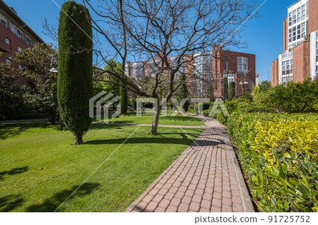 European courtyard in a modern residential complex for eco-friendly living in the Barcelona city, Spaine 91725752