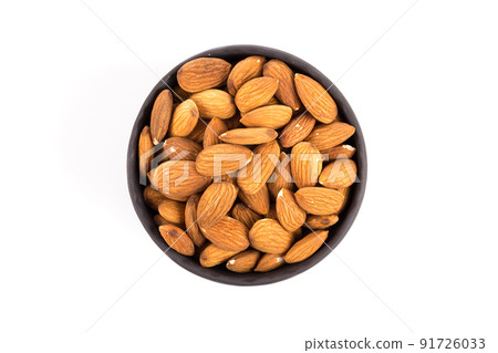 Almonds on a white background Almonds on a white background 91726033