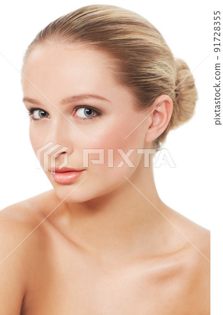 Take a moment to admire her beauty. A gorgeous young woman posing on a white background - Skincare Beauty. 91728355