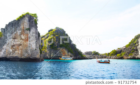 Cliffs of paradise. Panoramic view of beautiful islands with rocky cliffs, boats passing by - Copyspace. 91732754