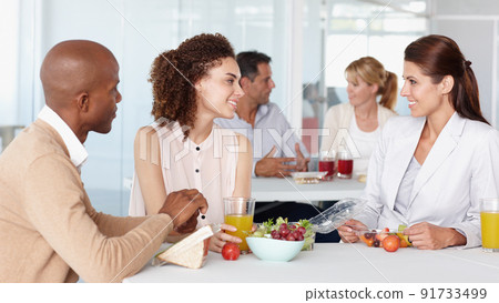 Colleagues and friends. Cropped shot of business colleagues in the office. 91733499