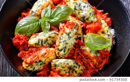 Malfatti, hot Italian spinach ricotta dumplings Malfatti, hot Italian spinach ricotta dumplings 91734308