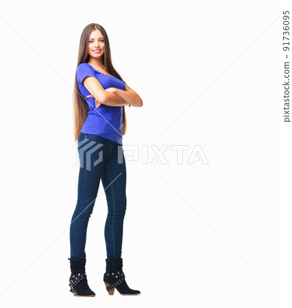 Confidence from head to toe. Studio portrait of a beautiful and confident young woman posing against a white background. Confidence from head to toe. Studio portrait of a beautiful and confident young woman posing against a white background. 91736095