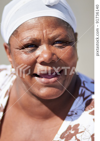 Shes a friendly face at the harbour. Cropped portrait of a fisherwoman. 91736140