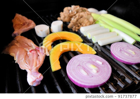 BBQ on a full-scale grill 91737877