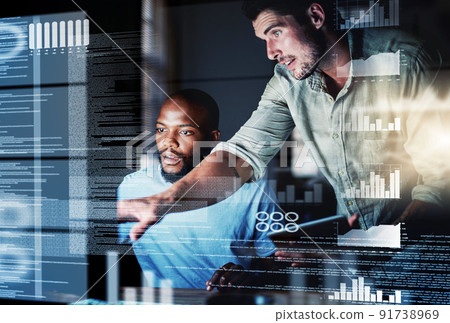Lets test this algorithm. Shot of two programmers working together on a computer code at night. 91738969
