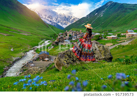 Tourist enjoy view of Ushguli village in Georgia. 91739573