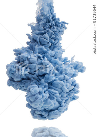 Its a colorful explosion. Studio shot of blue ink in water against a white background. 91739644