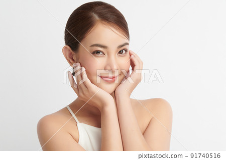 Beautiful young asian woman with clean fresh skin on white background, Face care, Facial treatment, Cosmetology, beauty and spa, Asian women portrait. Beautiful young asian woman with clean fresh skin on white background, Face care, Facial treatment, Cosmetology, beauty and spa, Asian women portrait. 91740516