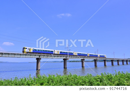 E257 series 500 series crossing the Kitaura Bridge on the JR Kashima Line 91744716